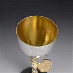 Modern limited edition silver goblet, 'made by order of the Dean and Chapter of St Paul's to commemorate the 300th anniversary of the laying of the foundation stone of the cathedral in 1675', designed by Jocelyn Burton for Aurum, the plain bowl with gilt interior, upon a parcel gilt stem in the form of a phoenix with wings outstretched,  limited edition no. 497, hallmarked Jocelyn Burton, London 1975, H16cm, boxed