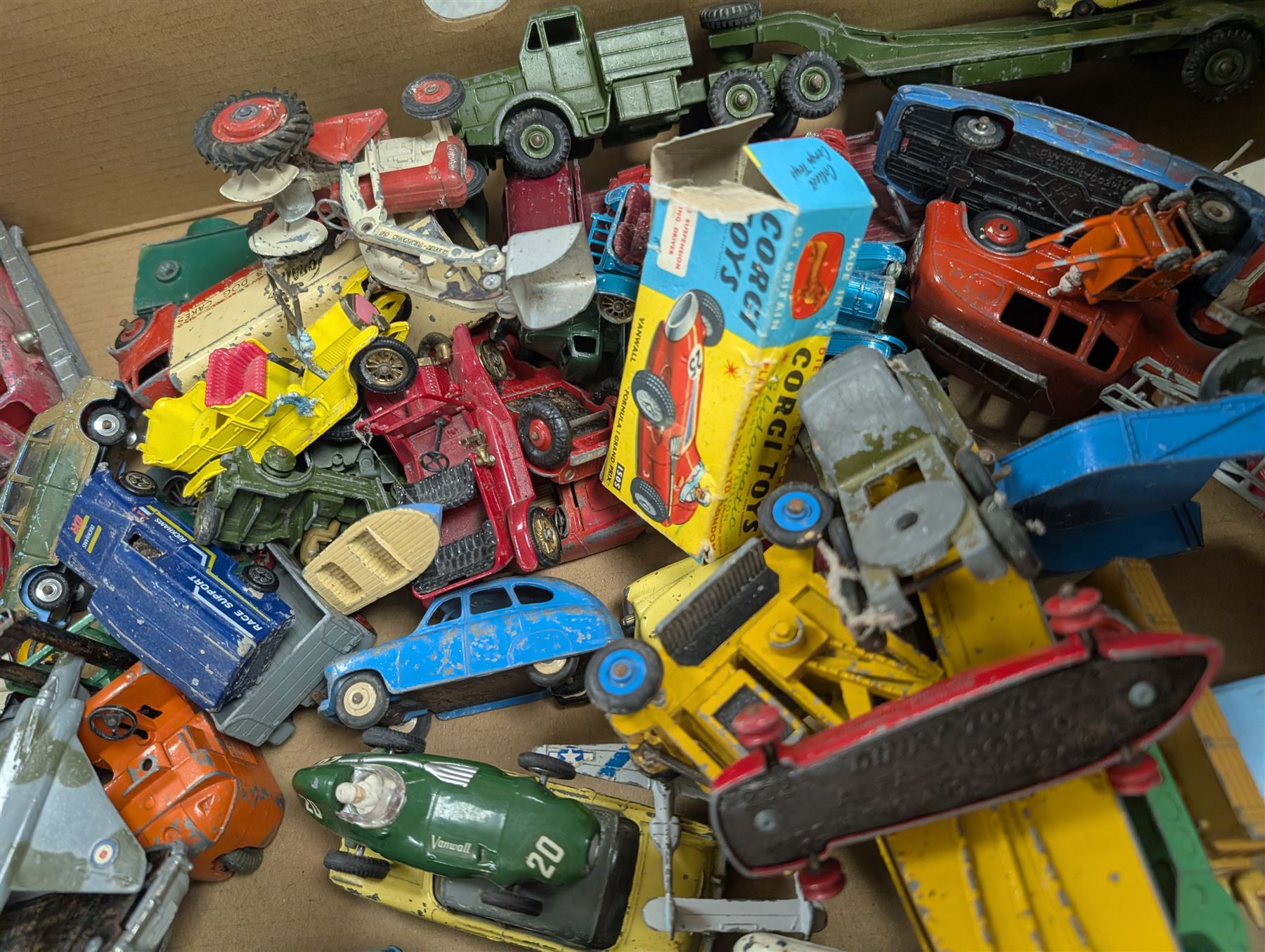 Collection of diecast model vehicles, including Dinky and Corgi examples, mostly loose and playworn