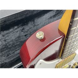 Gibson Marauder style six-string electric guitar with cherry coloured body, marked made in Japan L101cm; in locking hard carry case