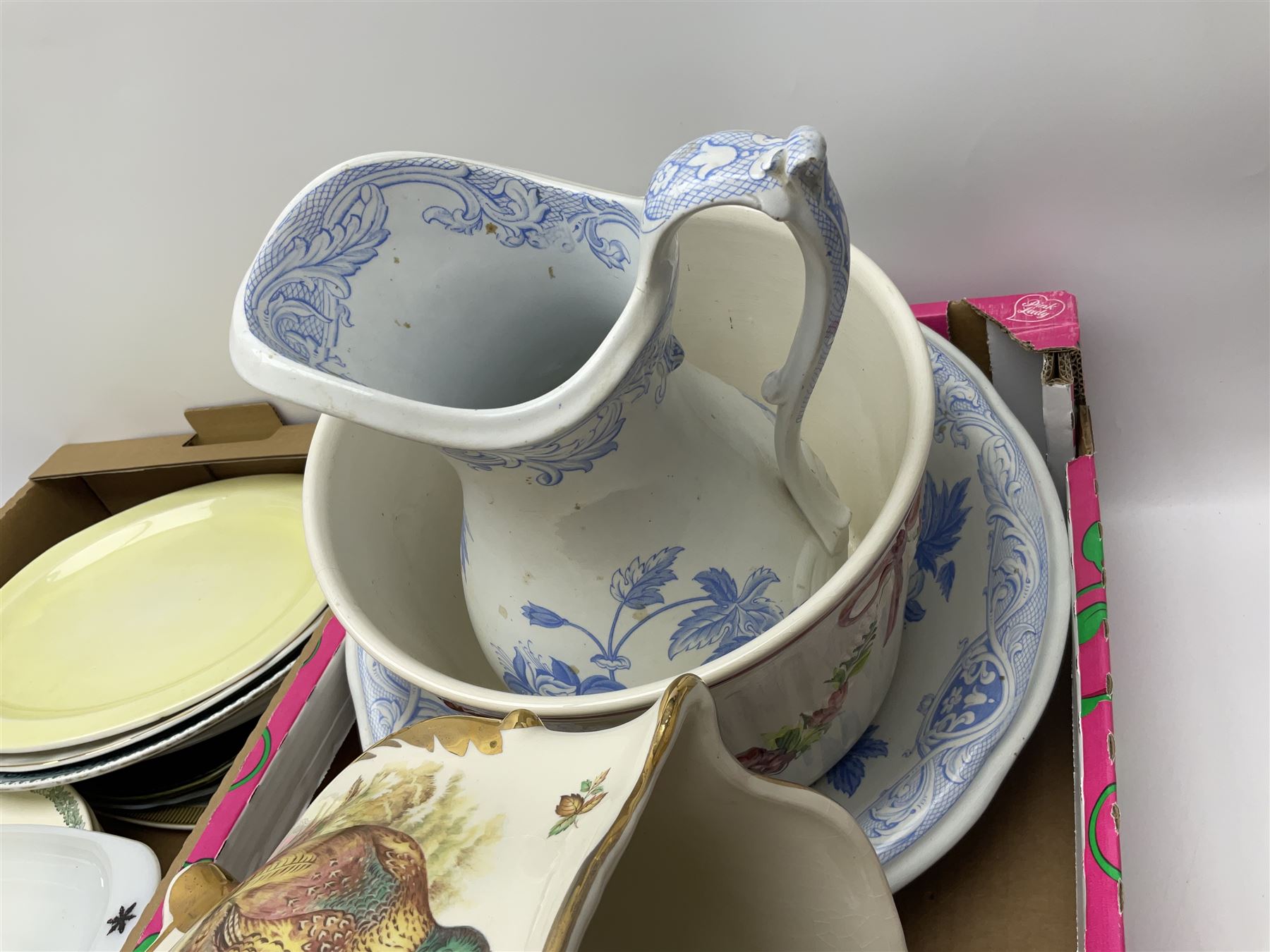 Two Poole Pottery dinner plates and a meat plate, four Copeland Spode Bermuda pattern dinner plates, Sadler jug, Keele St Pottery cottage tea wares, Torquay Motto ware, blue and white jug and bowl, two large planters and other ceramics, etc, in four boxes 