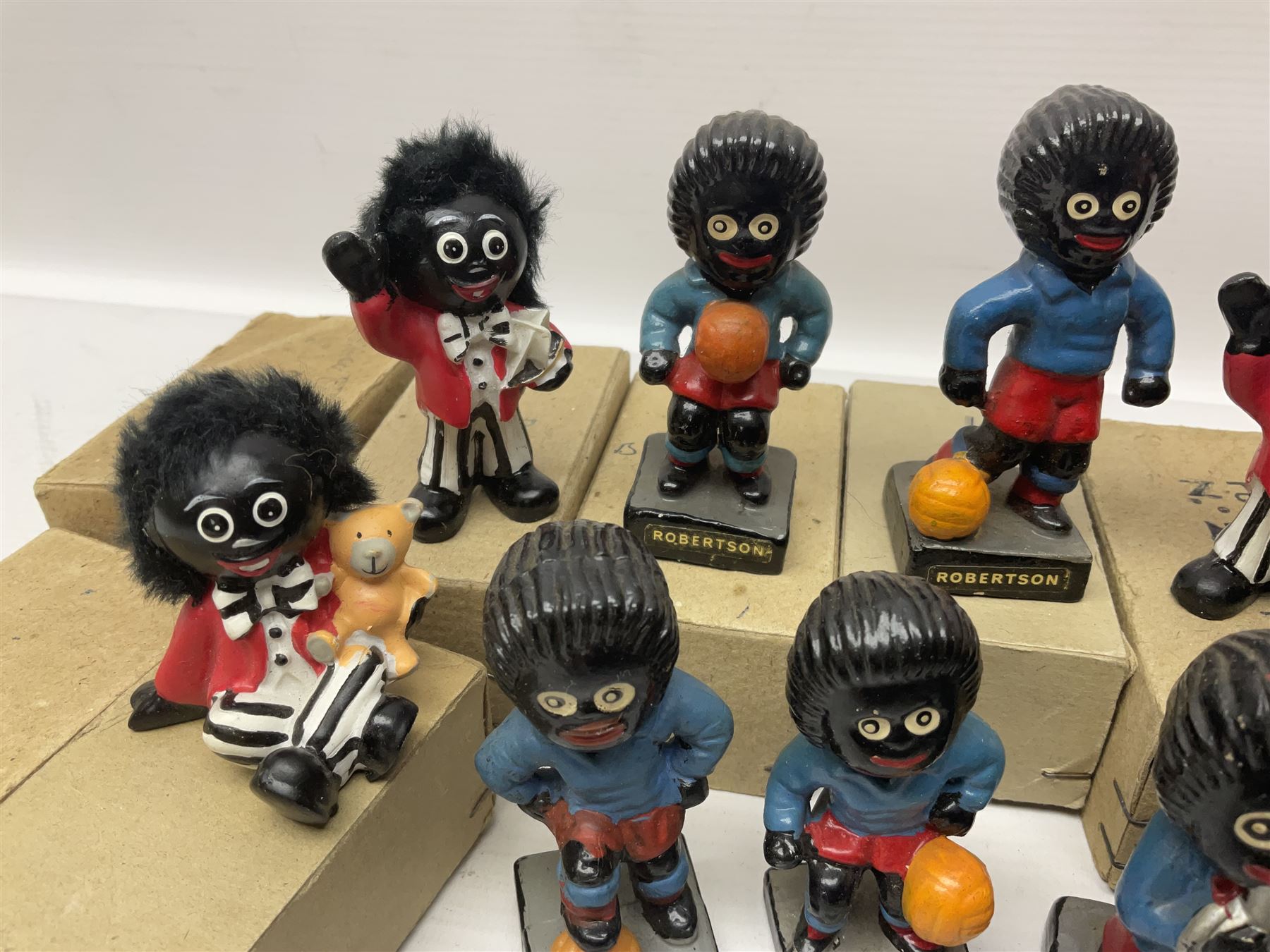 Collection of twenty two Robertson golly figures, H8cm