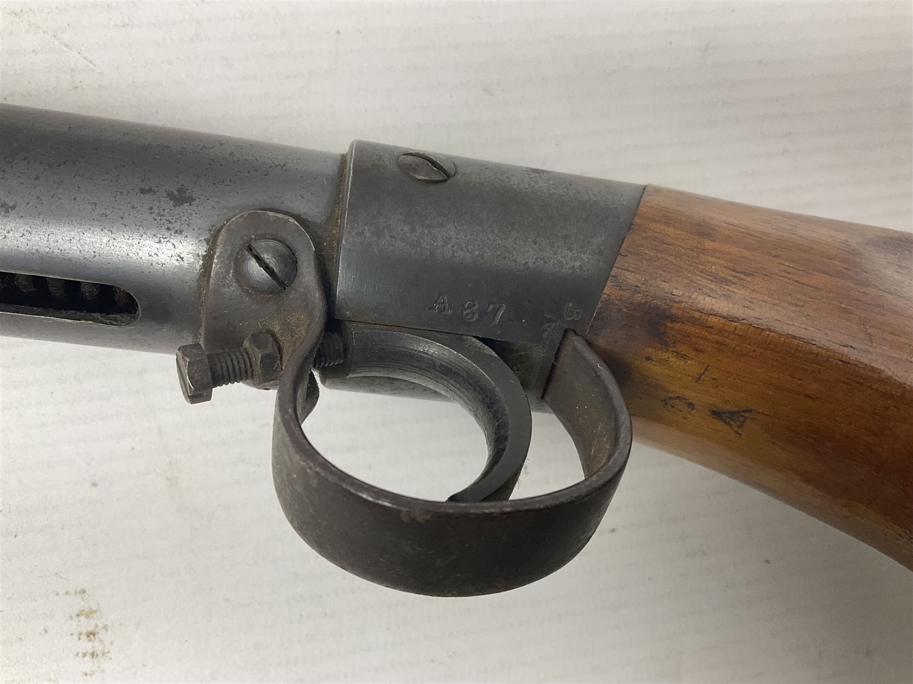 Early 20th century BSA Standard .177 Cal. Air Rifle (No.1), early A prefix number A67, with blued finish, top-loading, push-button underlever action, walnut semi-pistol grip stock with chequered BSA logo L101cm overall; with contemporary canvas case; NB: AGE RESTRICTIONS APPLY TO THE PURCHASE OF AIR WEAPONS.