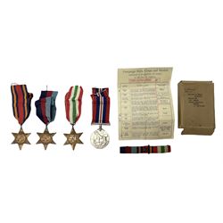 Four World War II medals comprising 1939/45 Star, Burma Star, Italy Star and 1939/45 Medal with issue box and slip and medal bar