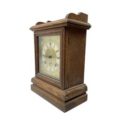 Ansonia- American oak cased 8-day mantle clock striking the hours on a gong. With key.