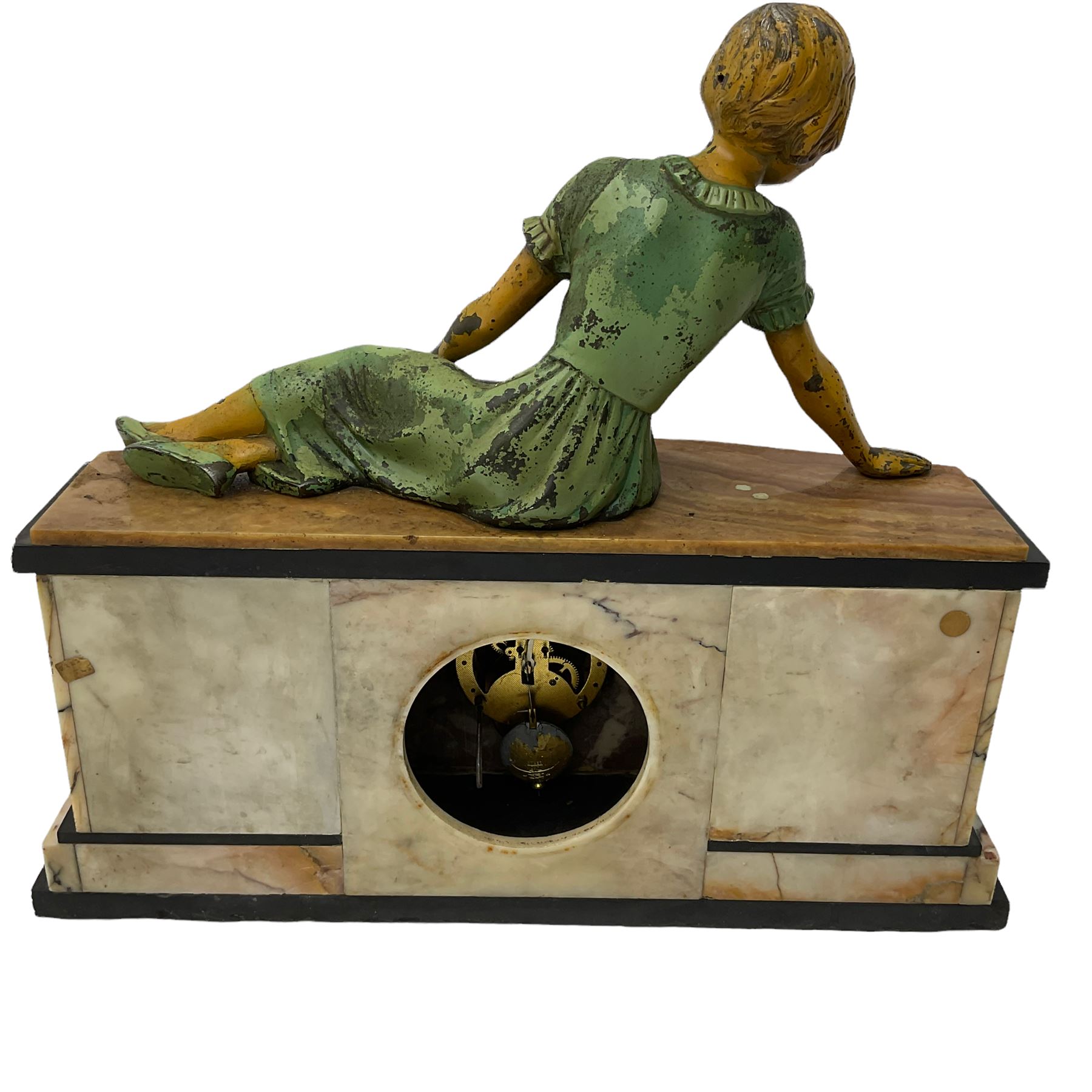 A 1950's Art Deco mantle clock in contrasting black, white and brown onyx marble, surmounted by a reclining spelter figure of a young lady, with a 6” square dial with a chrome bezel, Arabic numerals and chrome baton hands, with a timepiece spring driven movement.  With pendulum.

