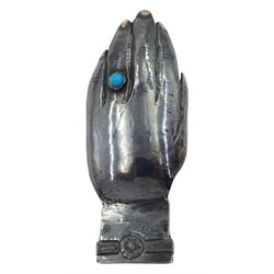 Modern Guild of Hull Silversmiths oxidised silver caddy spoon, modelled as an outstretched hand with engraved wristwatch to wrist and inset turquoise cabochon to finger, hallmarked Charles Richard Berkin of Beverley, London 1987, also marked with the three crowns mark of the Guild of Hull Silversmiths, L 8.7cm, approximate weight 0.89 ozt (27.9 grams)

Abraham Barachin was the last Hull silversmith to use the Hull mark of three ducal coronets in around 1706. 
However in 1983 the Assay Offices of Great Britain and the City of Kingston upon Hull granted the Guild of Hull Silversmiths permission to use the City's Coat of Arms as an additional mark on pieces they produced. 