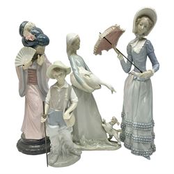 Four Lladro figures comprising Japanese figure Chrysanthemum no. 4990, Gone Fishing no 4809, Girl with goose and dog no 4866 and Aranjuez little lady with parasol, no 4879