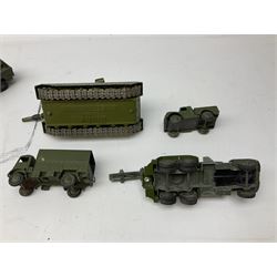 Dinky - twenty unboxed and playworn die-cast military vehicles including Mighty Antar tank Transporter No.660 with Centurion Tank No.651; Chieftain Tank; Army wagon No.623; Medium Artillery Tractor No.689; Berliet Gazelle; 10-Ton Army Truck No.622; US Jeep; three 1-Ton Cargo Trucks No.641; Armoured Car No.670; Armoured Personnel Carrier; Field Artillery Tractor No.688; Scout Car No.673; etc