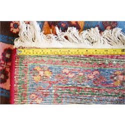 Persian Gabbeh indigo ground runner rug of garden design, the multi-coloured field decorated with five columns of panels in contrasting colours with stylised plant motifs, the guard band with trailing foliage