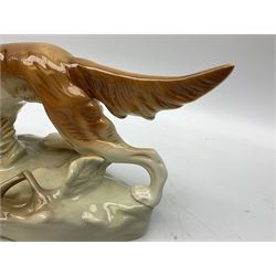 Royal Dux porcelain hunting dog with a bird, printed mark beneath, L36cm