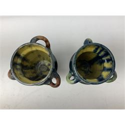Two studio pottery tyg vases, with blue, green, yellow and red glaze, with various impressed marks beneath, H18.5cm