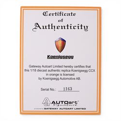 Autoart Signature 1:18 scale Koenigsegg CCX in orange, serial no. 1163, boxed with certificate of authenticity