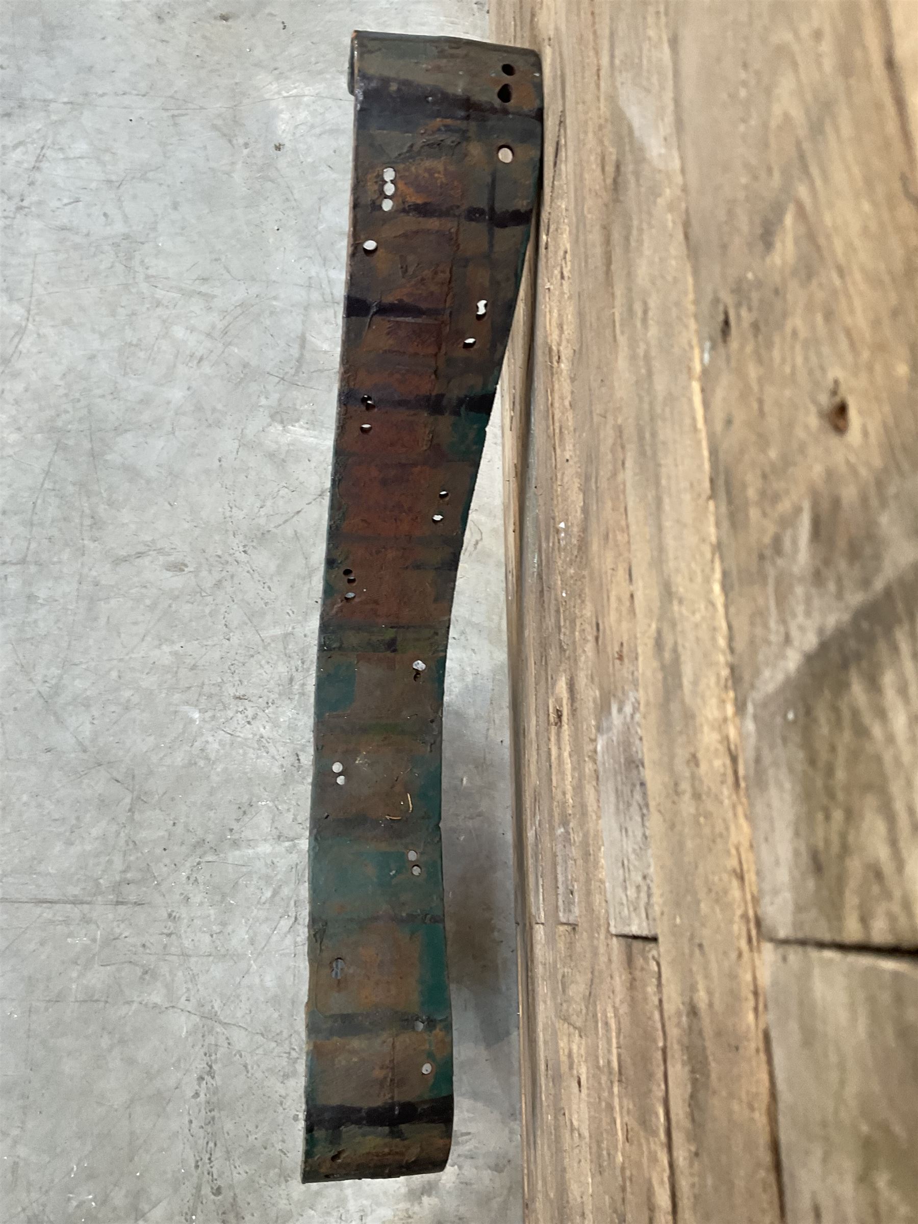 Early 20th century heavy cast iron three piece bench ends, decorated with scrolls and floral swags