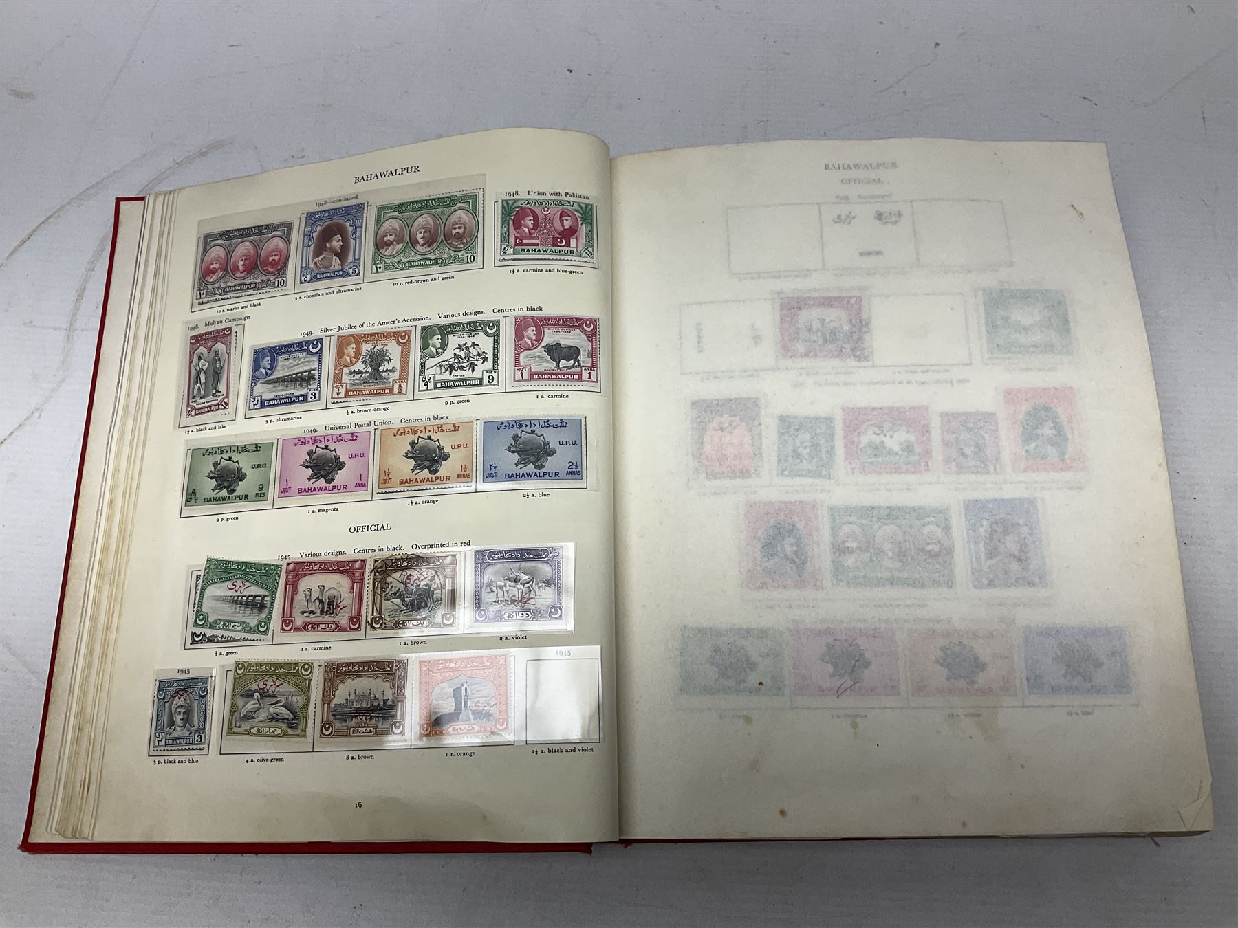 Single album collection of King George VI stamps, including Aden, Antigua, Ascension, Australia, Bahamas, Bahrain, Barbados, Basutoland, Bechuanaland, Bermuda, British Solomon Islands, Brunei, Burma, Cayman Islands, Dominica, Falkland Islands, Gambia, Gilbert and Ellice Islands, Gold Coast, Great Britain 1939-48 set to one pound including ten shilling dark blue, Grenada, Hong Kong, India, Ireland, Jamaica, Leeward Islands, Malta, Mauritius, New Zealand etc