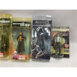 Sixteen carded action figures comprising seven 'Gears of War'; four 'Hitchhikers Guide to the Galaxy'; two 'Torchwood'; 'Planet of the Apes'; 'Bruce Lee'; and 'Assassin's Creed'; all in unopened packs (16)
