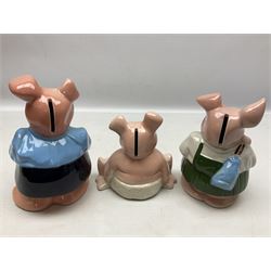 Set of five Wade NatWest money boxes, comprising father, mother, boy, girl and baby, four with original boxes 