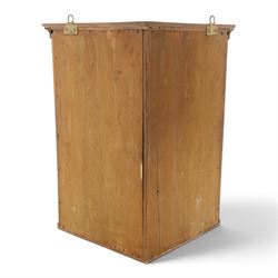 Edwardian walnut hanging corner cabinet, single panelled door with applied carved foliate decoration enclosing shelf 