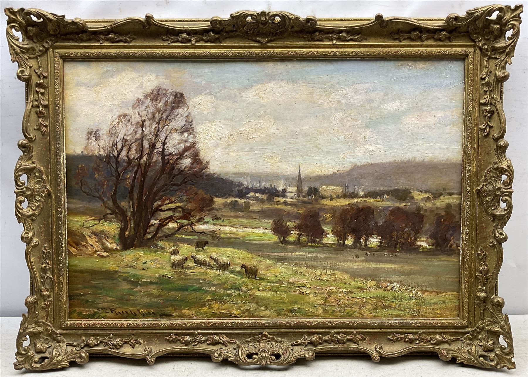 William Charles Rushton (British 1860-1921): Yorkshire Landscape with Sheep and Town in the Distance, oil on panel signed 48cm x 74cm