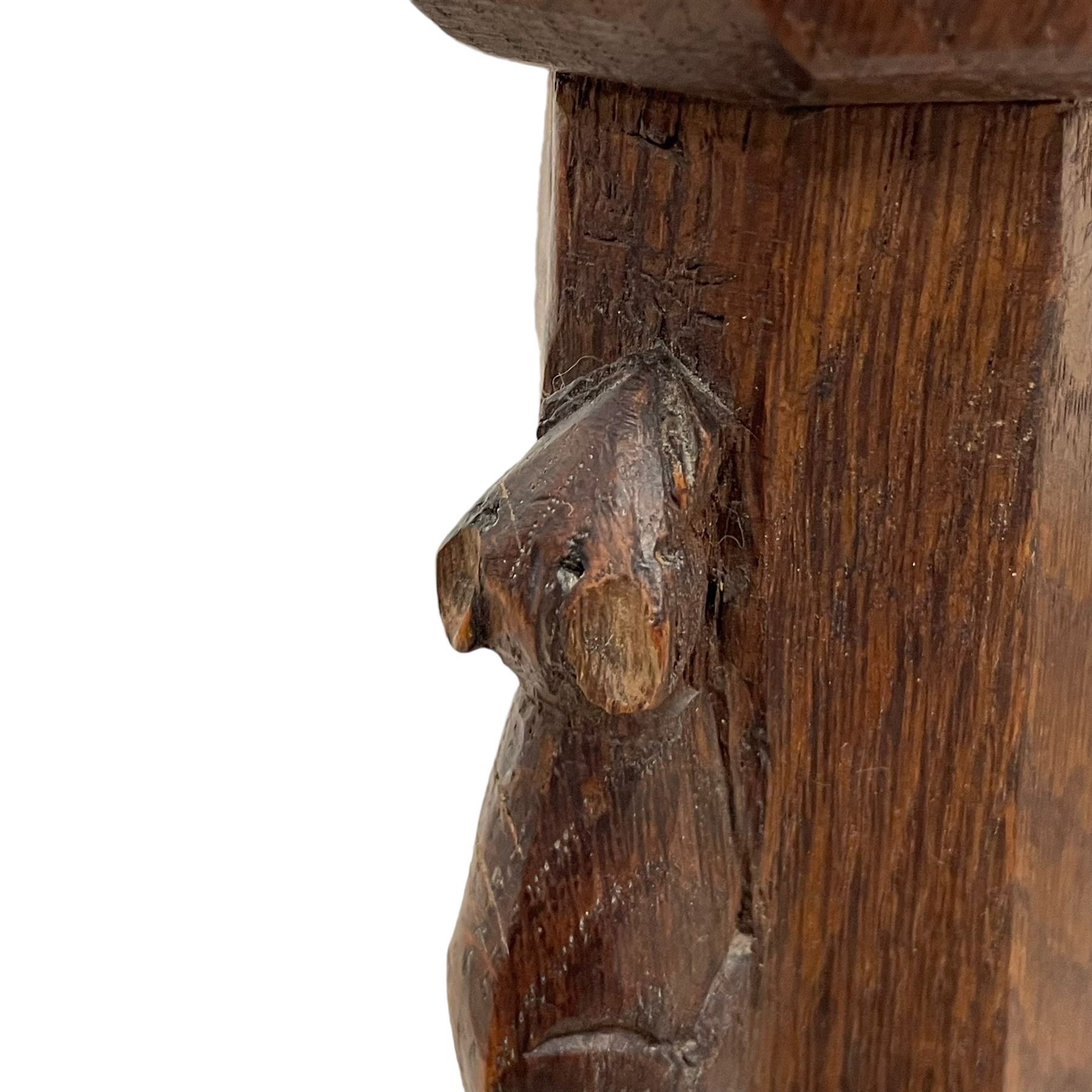 Mouseman - circa. 1930s set of six (4+2) oak dining chairs, panelled back carved with the Bagshawe family crest, the moto 'Forma Flos Fama Flatus' over an arm grasping a bugle-horn with ribbon tie and Yorkshire rose motif, adzed frame, leather lattice strap seat, on octagonal supports united by stretchers, two carvers and four side chairs, each carved with mouse signature, by Robert Thompson of Kilburn 

Provenance: Owned since manufacture by the Bagshawe family, descendants of the Staithes Group Artist Joseph Richard Bagshawe RBA (1870-1909).