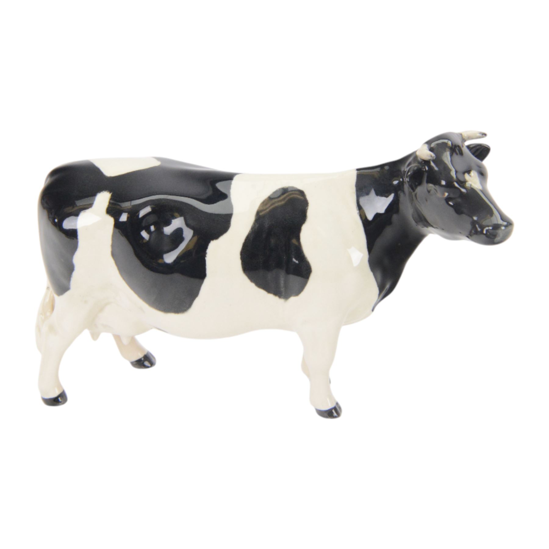 Beswick Friesian Cow family group, comprising Bull CH. Coddington Hilt Bar 1439, Cow CH. Claybury Leegwater 1362 and Calf 1249