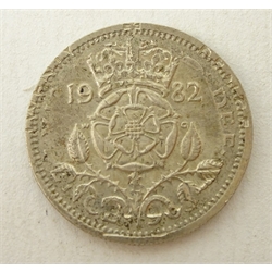  Coin - round coin which appears to be a sixpence but has a print on top of a 1982 twenty pence coin - this is possibly an error coin or just a fantasy coin, there is no supporting documentation, approximate weight 2.85 grams  