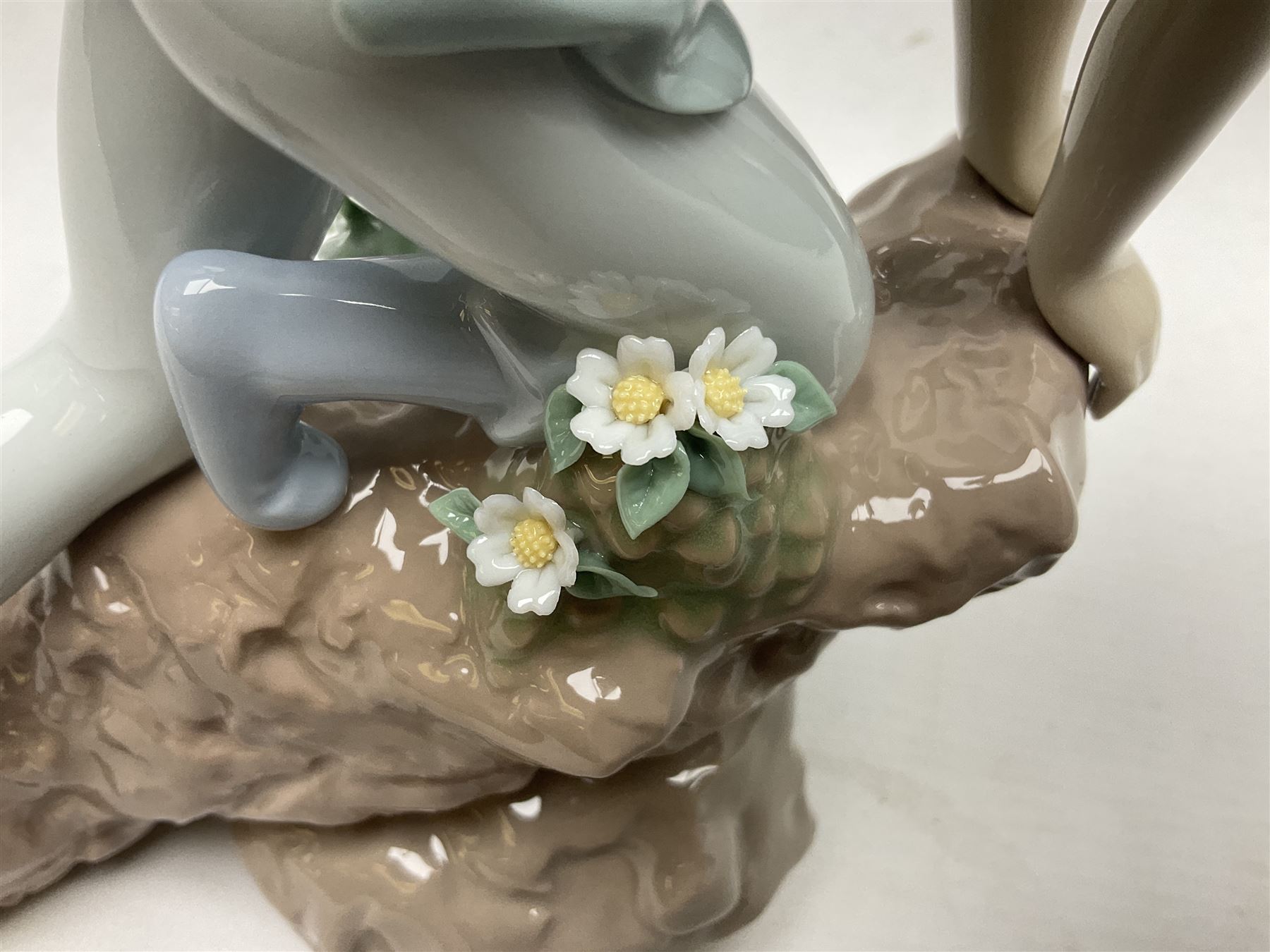 Lladro Privilege figure, Prince of Elves, modelled as an elf with wings leaning upon a rock, with original box, no 7690, sculpted by Joan Coderch, year issue 2001, year retired 2003, H23cm