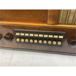 1939 Bush Type PB.63 valve radio, with Bakelite knobs and button panel, W52cm D27cm H42cm, together with a Ferguson Gram floor standing radio in mahogany case with Bakelite knobs, H72cm