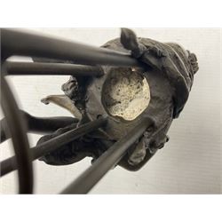 Art Deco style bronze modelled as a female figure seated upon a chair holding an apple, after 'Pierre Collinet', H28cm