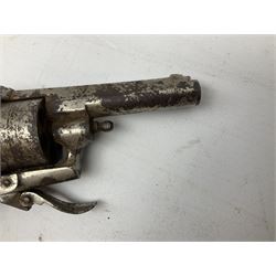 19th century 7mm six-shot pin-fire revolver, with folding trigger, two-piece ebonised grip and ejector rod in butt L17cm