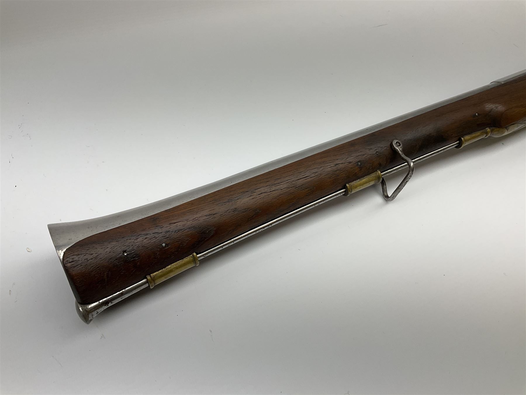 Reproduction 11-bore black-powder blunderbuss, the 61.5cm barrel with black-powder marks and ramrod under, walnut full stock with steel lock and brass fittings and two sling swivels, serial no.155, L101cm overall SHOTGUN CERTIFICATE REQUIRED