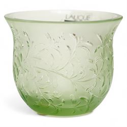 Lalique green glass tea light holder decorated with the coriandre pattern H8cm, another in the basil pattern H8cm and another with trailing leaves H8cm, all signed 'Lalique, France'