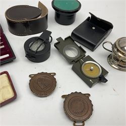 Compass technical drawing set in fitted case, gold plated Cinque Port halfpenny token in case, two late 19th century medals to include 1880 medical jurisprudence, other metalware etc