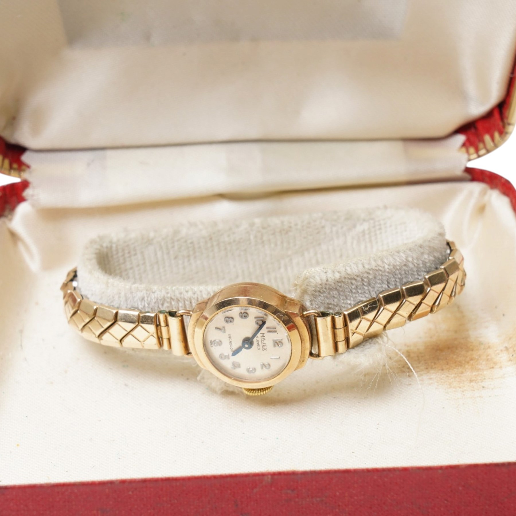 Majex gold ladies manual wind wristwatch, on rolled gold expanding strap bracelet, boxed