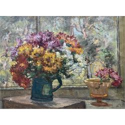 St Ives School (Early 20th century): Still Life - Flowers in a Jug, oil on canvas unsigned, with 'James Lanham, Artist's Colourman, St Ives Cornwall' metal label to stretcher 44cm x 60cm