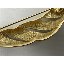 Christian Dior costume jewellery, comprising pair of pearlescent clip on earrings, enamel and paste leaf brooch and a pierced stylised leaf brooch, each stamped Chr.Dior Germany and in original boxes