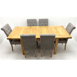 Light oak extending dining table, two leaves, square tapering supports (W200cm, H92cm, H78cm) and six Very roll top high back chairs upholstered in buttoned grey fabric (W45cm)