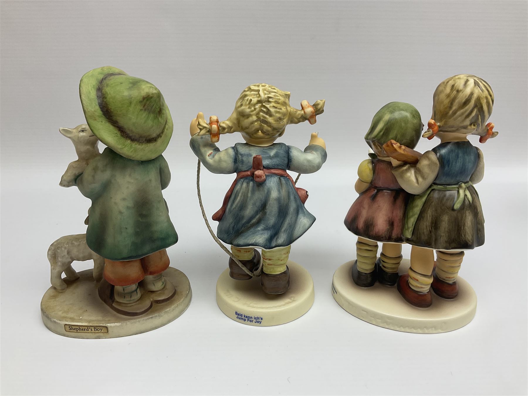 Twenty five Hummel figures by Goebel, to include Tuning up, Blessed Event, Book Worm, The Little Architect etc 