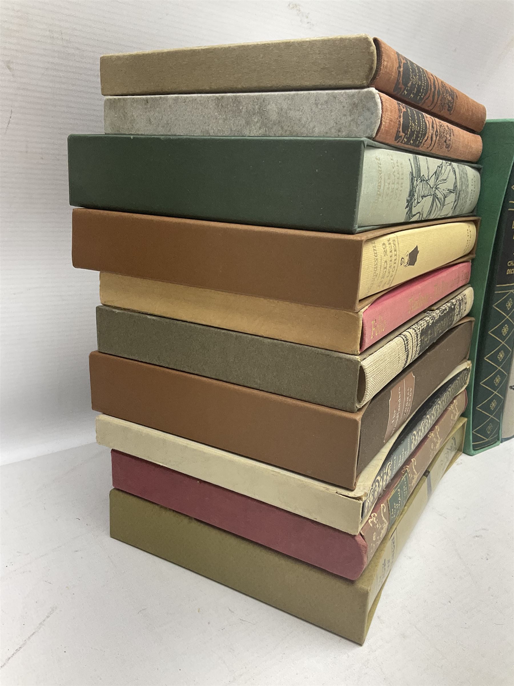 Folio Society; twenty two volumes, to include Vanity Fair, The Riddle of The Sand, The Necklace & Other Stories, Under Milk Wood, Barnaby Rudge etc 