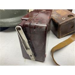 Bakelite cased Megger Insulation tester, by Evershed and Vignoles Ltd, Acton Lane Works, Chiswick, London W4, RW Munro Ltd air speed knots gauge, American green army helmet, The War Illustrated, WW2 aircraft photographic postcards, etc