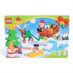 Five Lego sets, comprising Duplo Santa's Winter Holiday no. 10837, Christmas Decor Set no. 40604, Wintertime Carriage Ride no. 40603, Santa's Delivery Truck no. 40746 and Ice Skating Rink no. 40416, all boxed