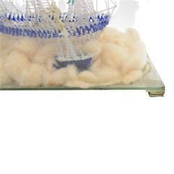 Victorian glass frigger of a three mast ship and a smaller ship under a glass dome, H38cm