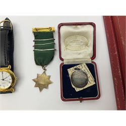 Ladies Accurist 9ct gold manual wind wristwatch, on gilt metal bracelet, together with a silver and enamel fob, for the Transport and General Workers Union, with personal engraving to reverse, hallmarked, a safe driving medal and a Quartz wristwatch