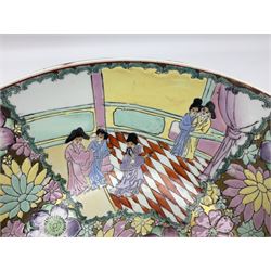 Chinese Qing Dynasty bowl, decorated in polychrome enamels with figures and courting couples, bordered by flower heads upon a gilt ground, with red cross mark beneath, D30.5cm