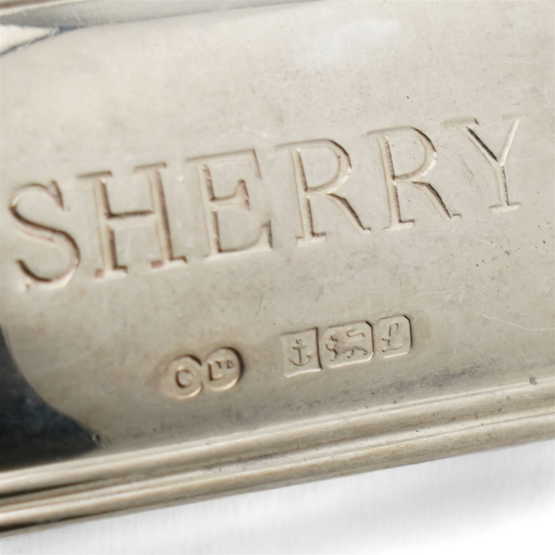 Edwardian silver miniature hay rake with ebonised handle L20cm Birmingham 1908 Maker T H Hazlewood & Co., pair of silver decanter labels 'Whisky' and 'Sherry' Birmingham 1985, another 'Port', silver vesta case and small silver dish D8cm