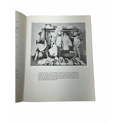 Heidi Ott doll in tartan dress, navy floral dress with white lace and ribbon detailing, striped blue and white dress and a 'Head to Toe' book