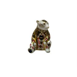 Three Royal Crown Derby paperweights, comprising, mountain bear with gold stopper, honey bear with silver stopper and polar bear with silver stopper