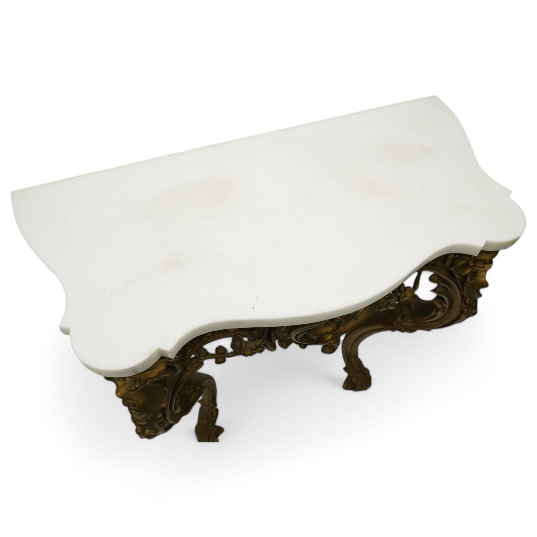 Late 19th to early 20th century giltwood and gesso console table with marble top, shaped white marble top, the base with pierced front decorated with shells and trailing leafy branches with flower heads, on cabriole supports with shell decorated knees, scrolled feet with acanthus leaf terminals 