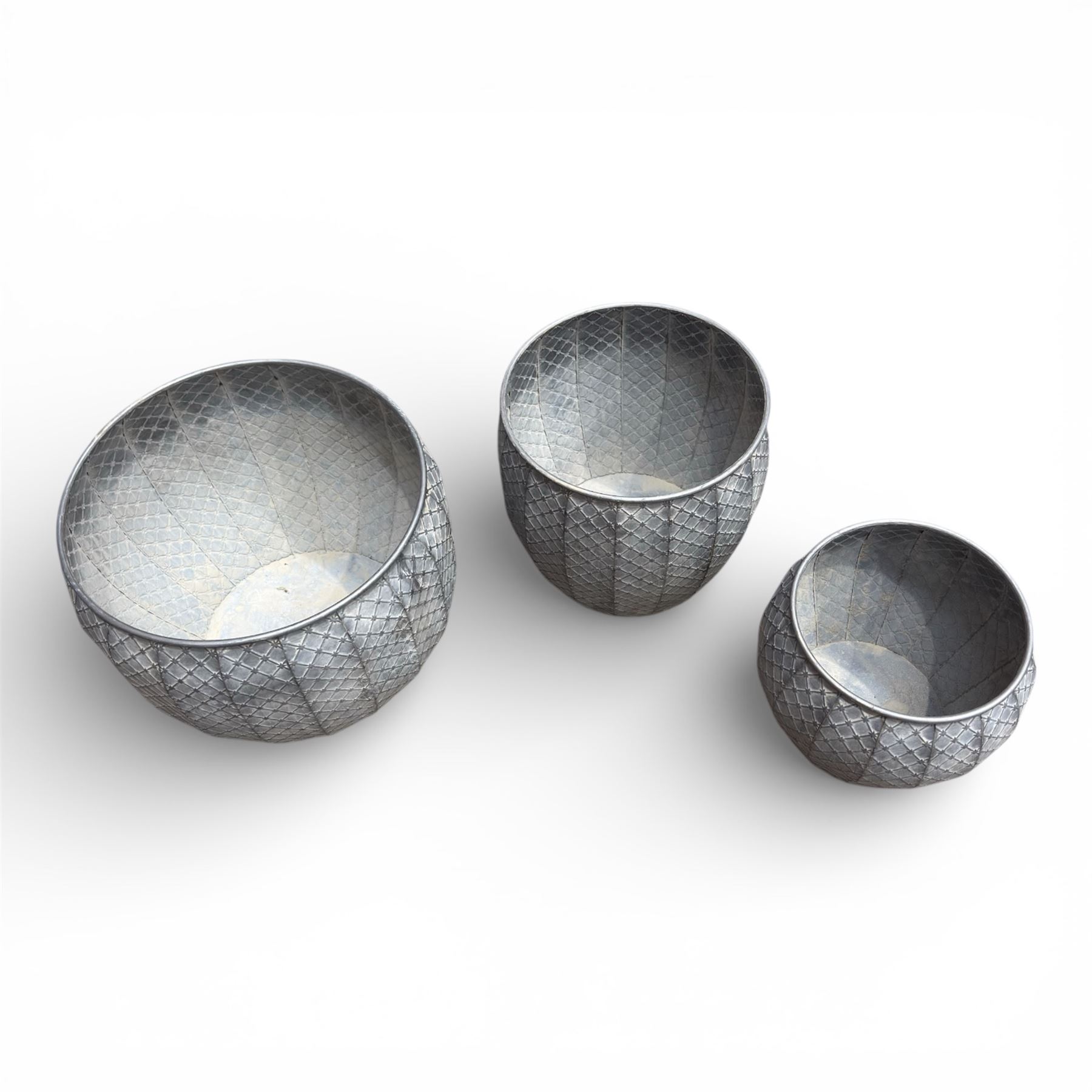 Set of three graduating galvanised circular planters