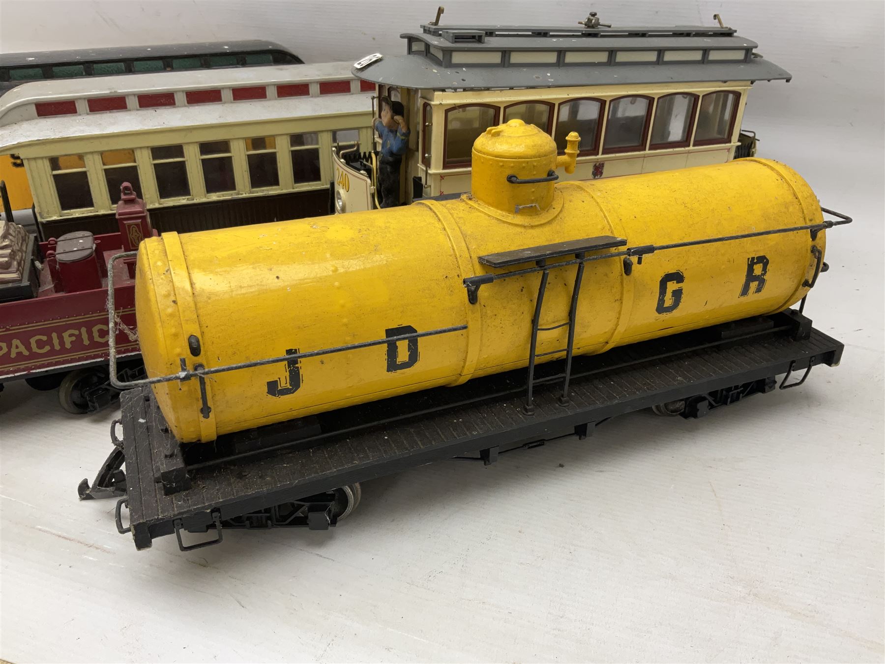 Six Bachmann G scale, gauge 1 rolling stock wagons and carriages, including tram coach, log carrier and tanker, etc, all unboxed 