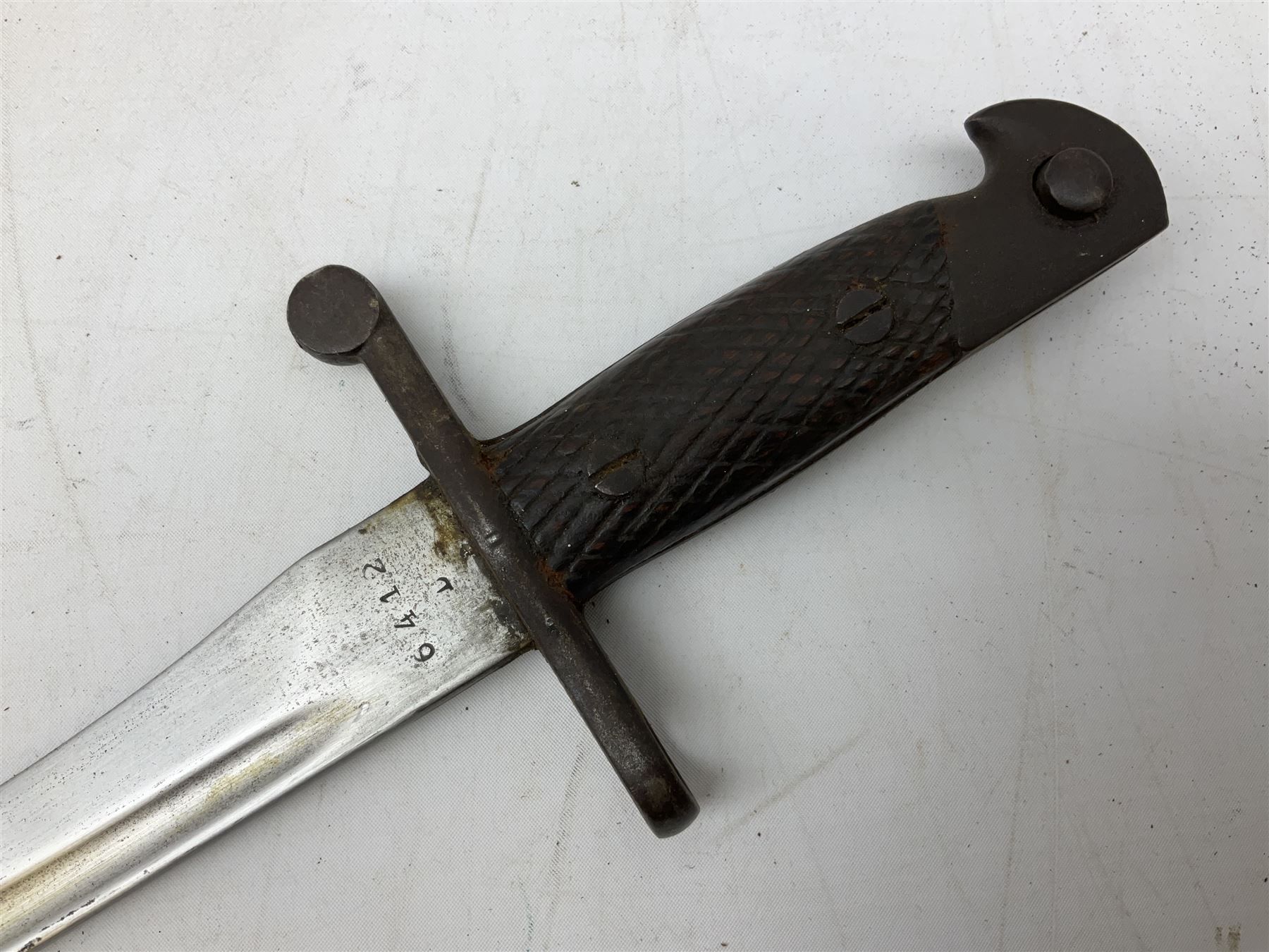 Austrian Model 1895 carbine NCO's knife bayonet with 25cm fullered steel blade; in steel scabbard with webbing frog L39cm overall; and Spanish Model 1941 Bolo bayonet with 25cm fullered steel blade No.6412D; in steel scabbard (2)